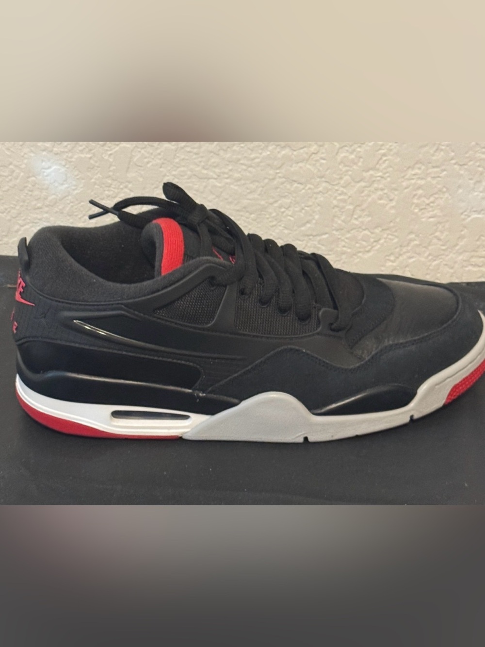 Jordan 4 RM Bred Men's Black and Red Athletic Sneakers